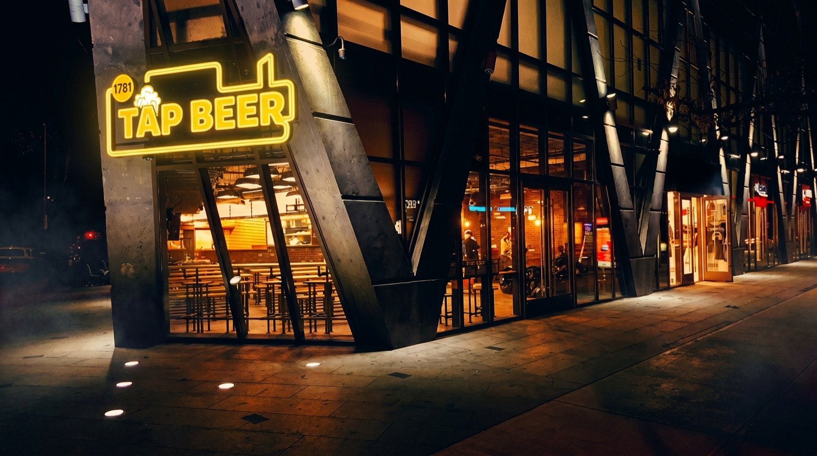 1781 Tap Beer storefront at night